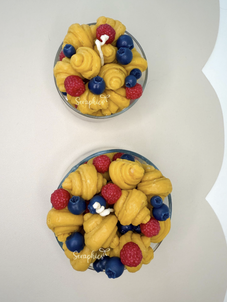 Two croissants candle jars on white surface – dessert candles