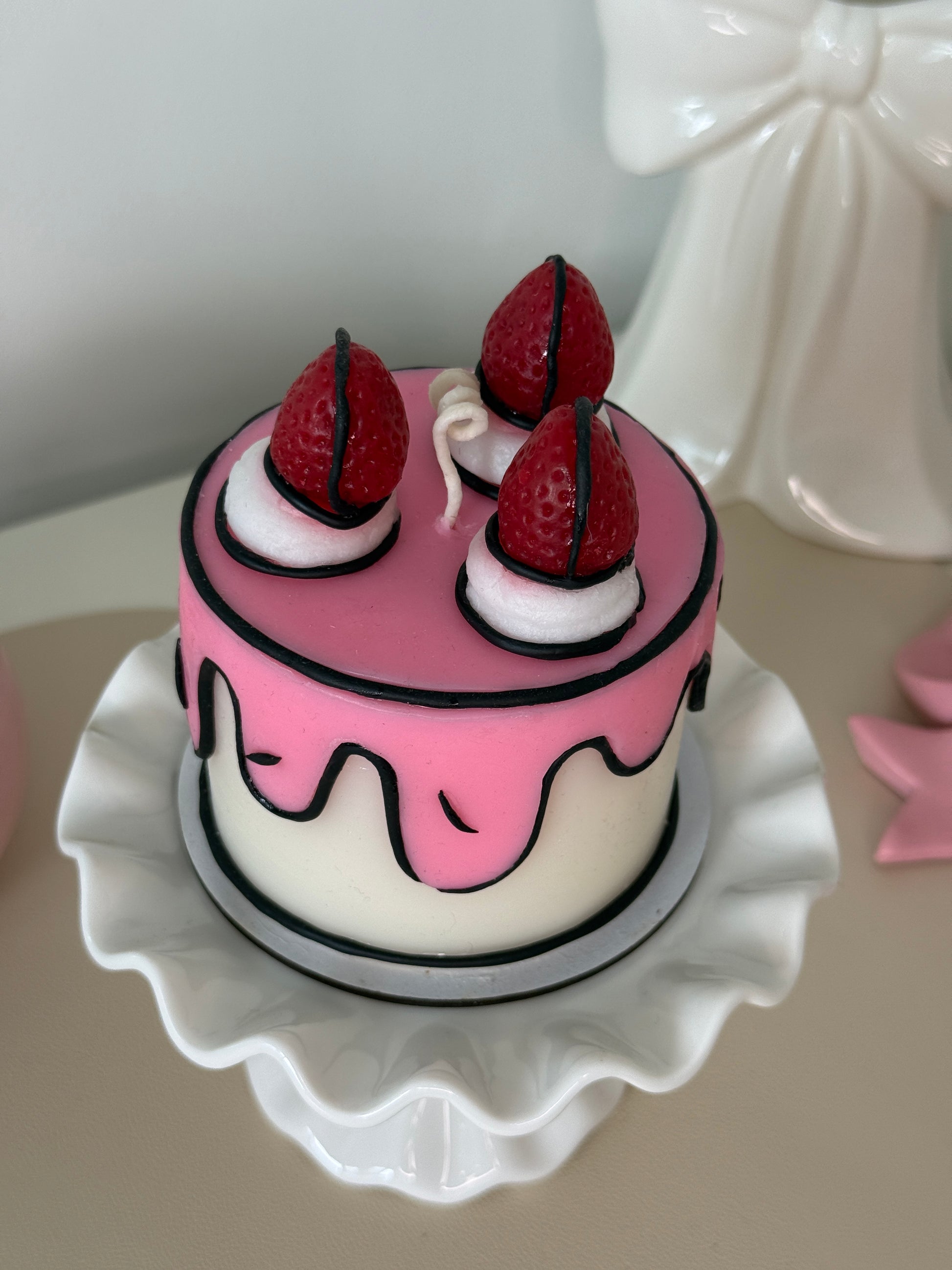 3D birthday cake candle by Seraphics CA — pink and white sculptural candle